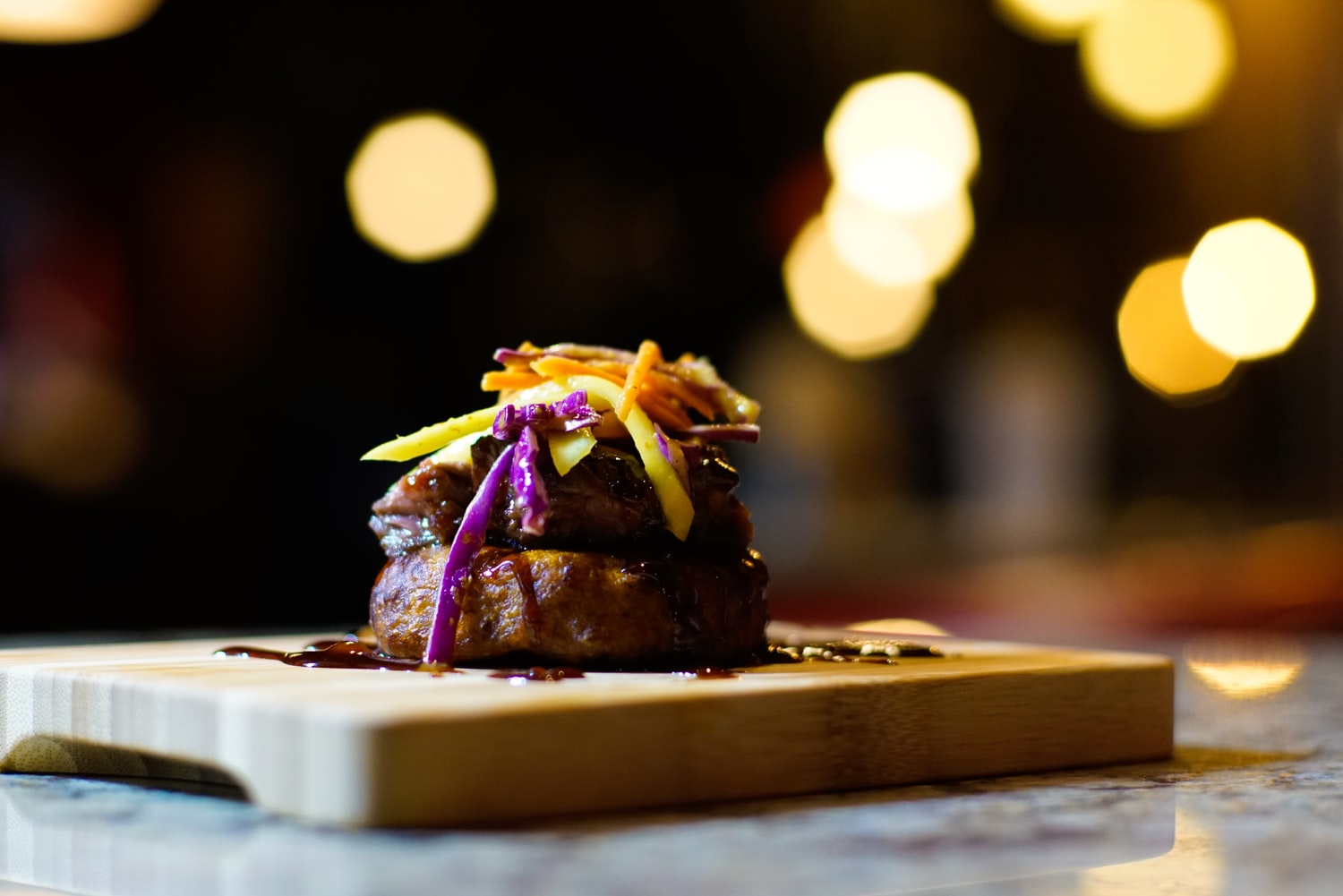 best steak in Austin: steak with vegetable toppings