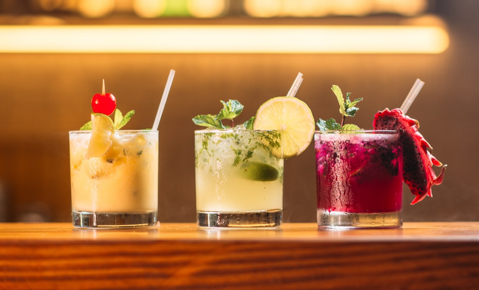 Best Bars in Austin: three cocktails on bar