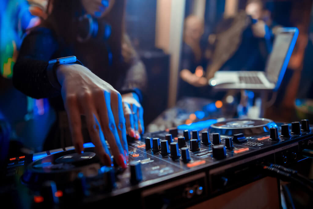 best clubs in Austin: DJ spinning